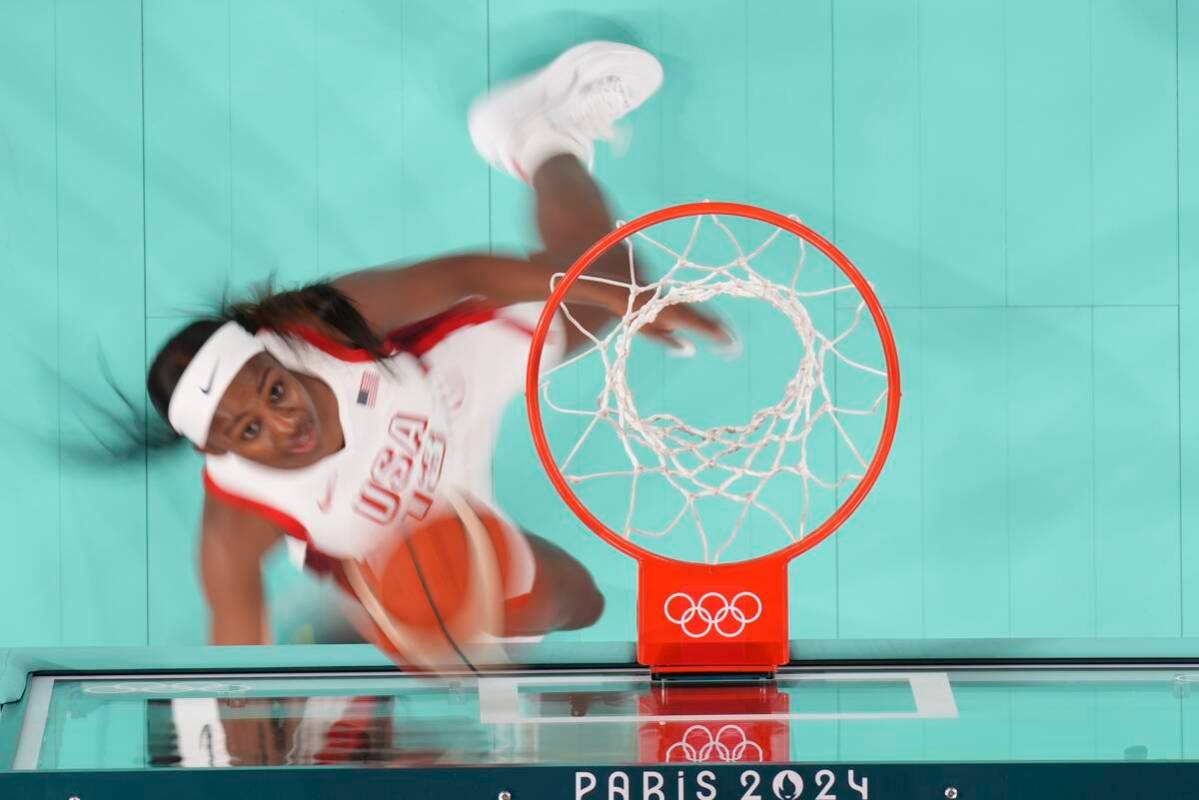 United States' Jackie Young (13) makes a shot during a women's semifinal basketball game agains ...