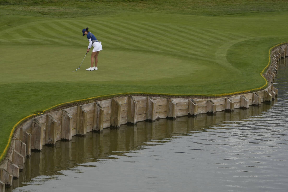 Rose Zhang, of the United States, putts on the 1st green during the third round of the women's ...