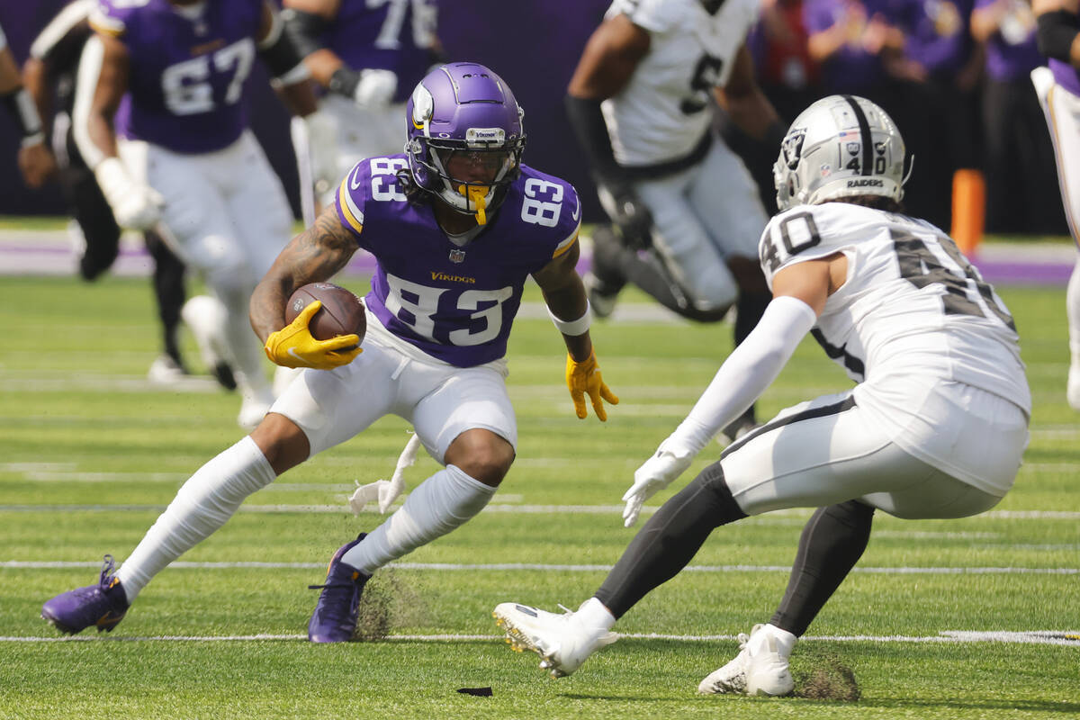 Minnesota Vikings wide receiver Jalen Nailor (83) advances the ball against Las Vegas Raiders s ...