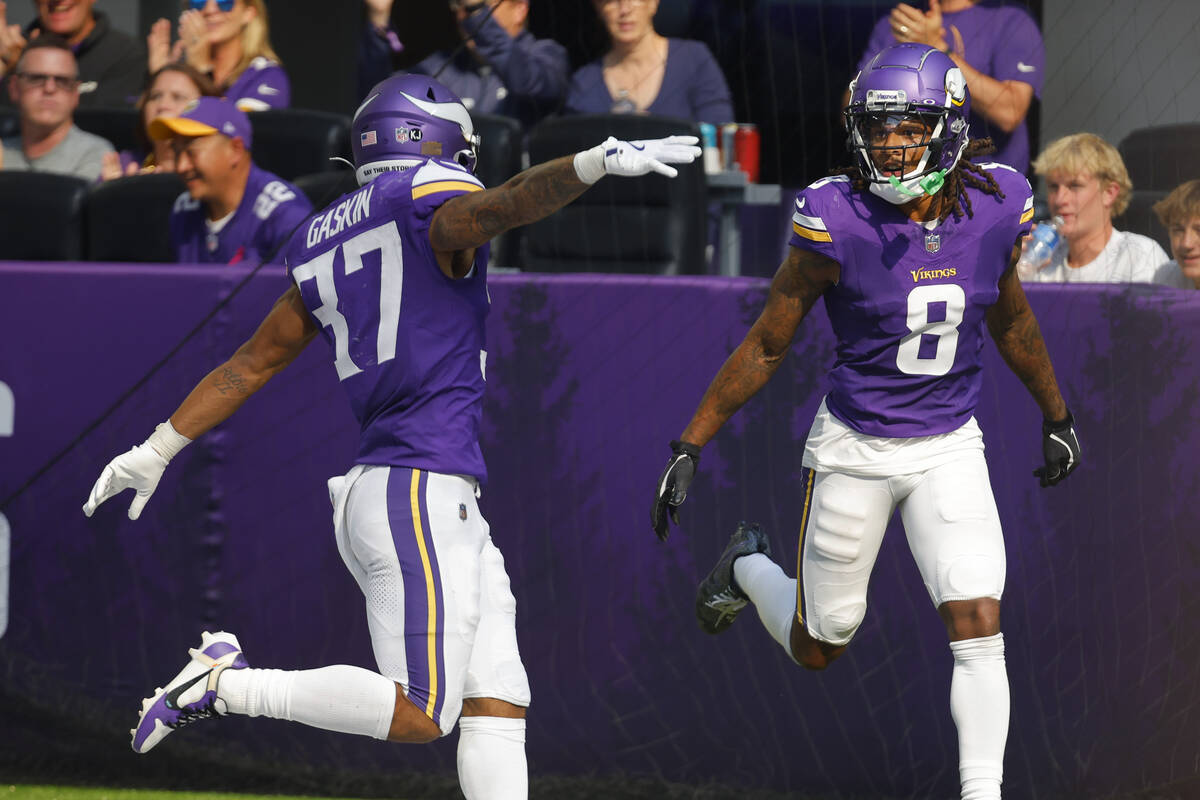 Minnesota Vikings wide receiver Trishton Jackson (8) celebrates his touchdown with teammate Myl ...