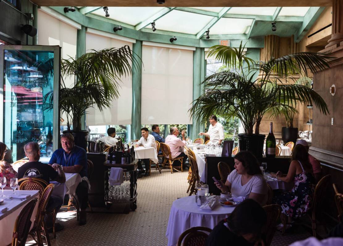 Guests dine in the pavilion at Mon Ami Gabi at Paris Las Vegas hotel-casino in Las Vegas, Tuesd ...