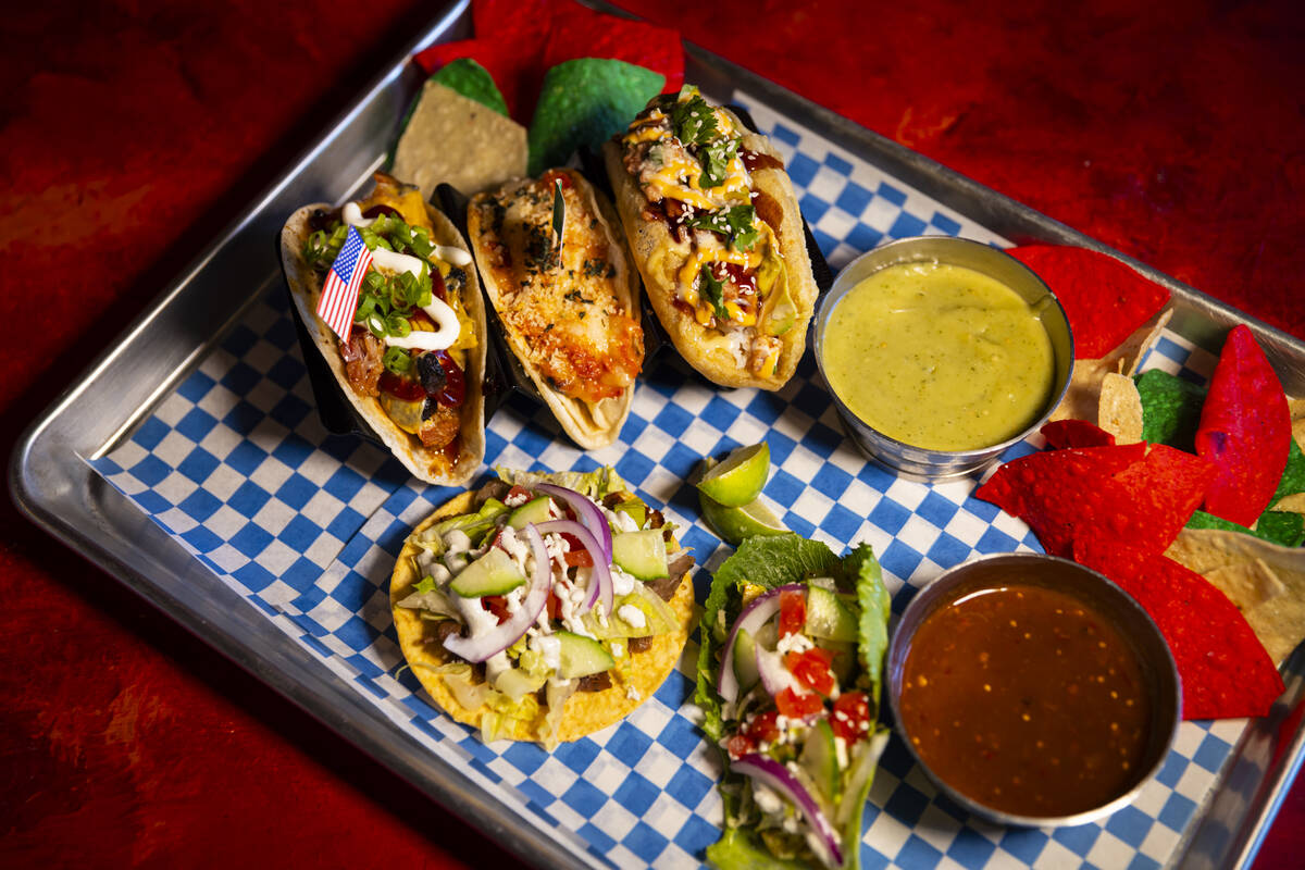 A plate of tacos with chips and salsa is seen at International Taco Co. on Wednesday, Aug. 14, ...