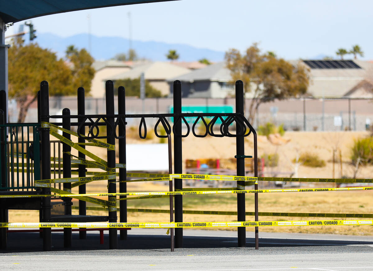 A playground is taped off at an event to showcase the hybrid instructional model for Pre-K to 3 ...