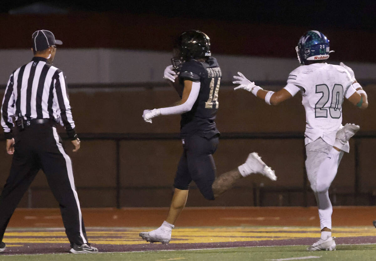 Faith Lutheran's Cale Breslin (14) scores a touchdown against Green Valley during the second ha ...