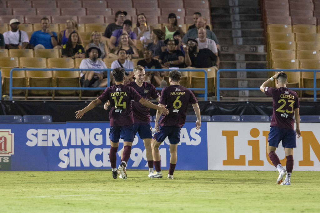 Detroit City FC players celebrate a goal during a USL Championship soccer game against the Las ...