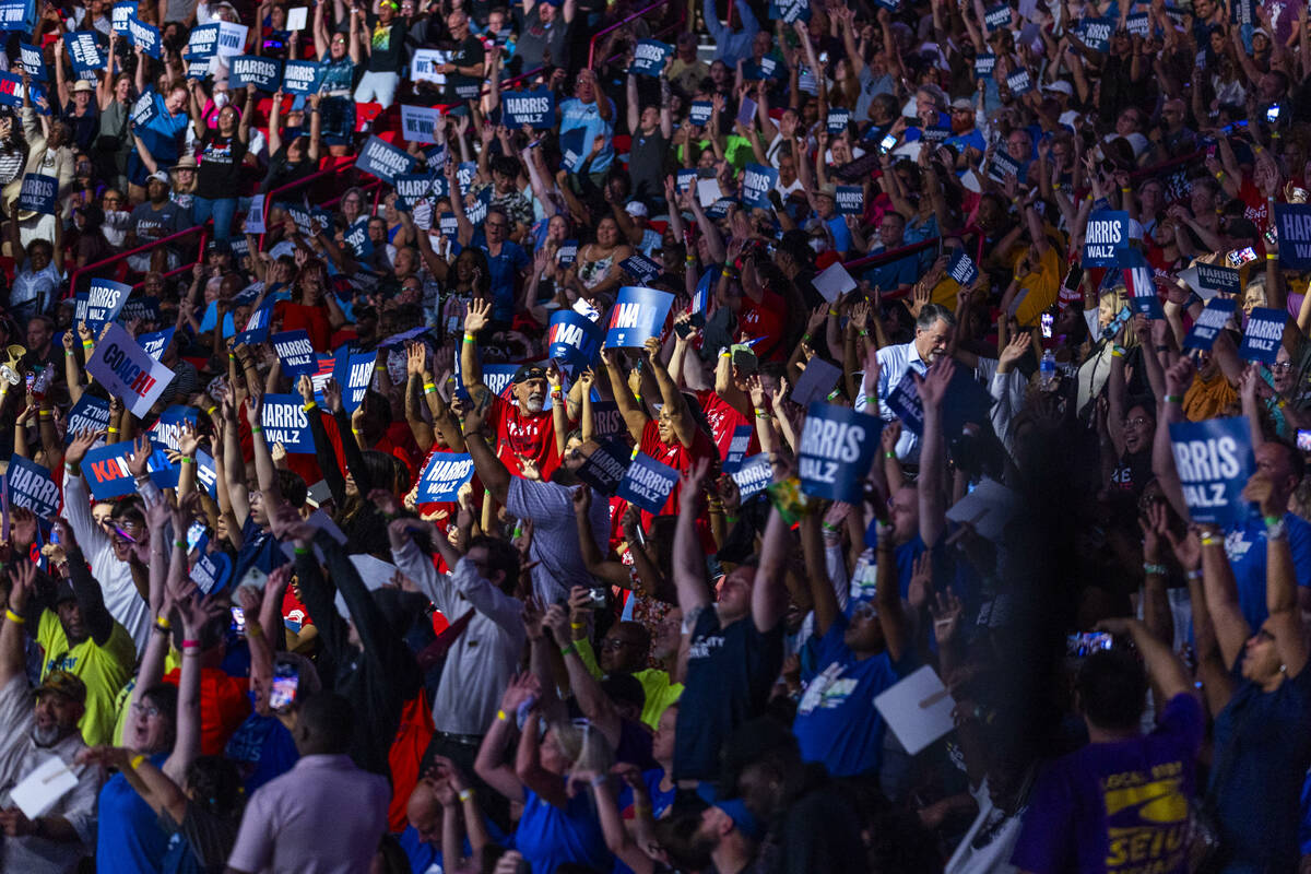 The crowd gets pumped up while dancing to music by DJ D-Nice as Vice President Kamala Harris an ...