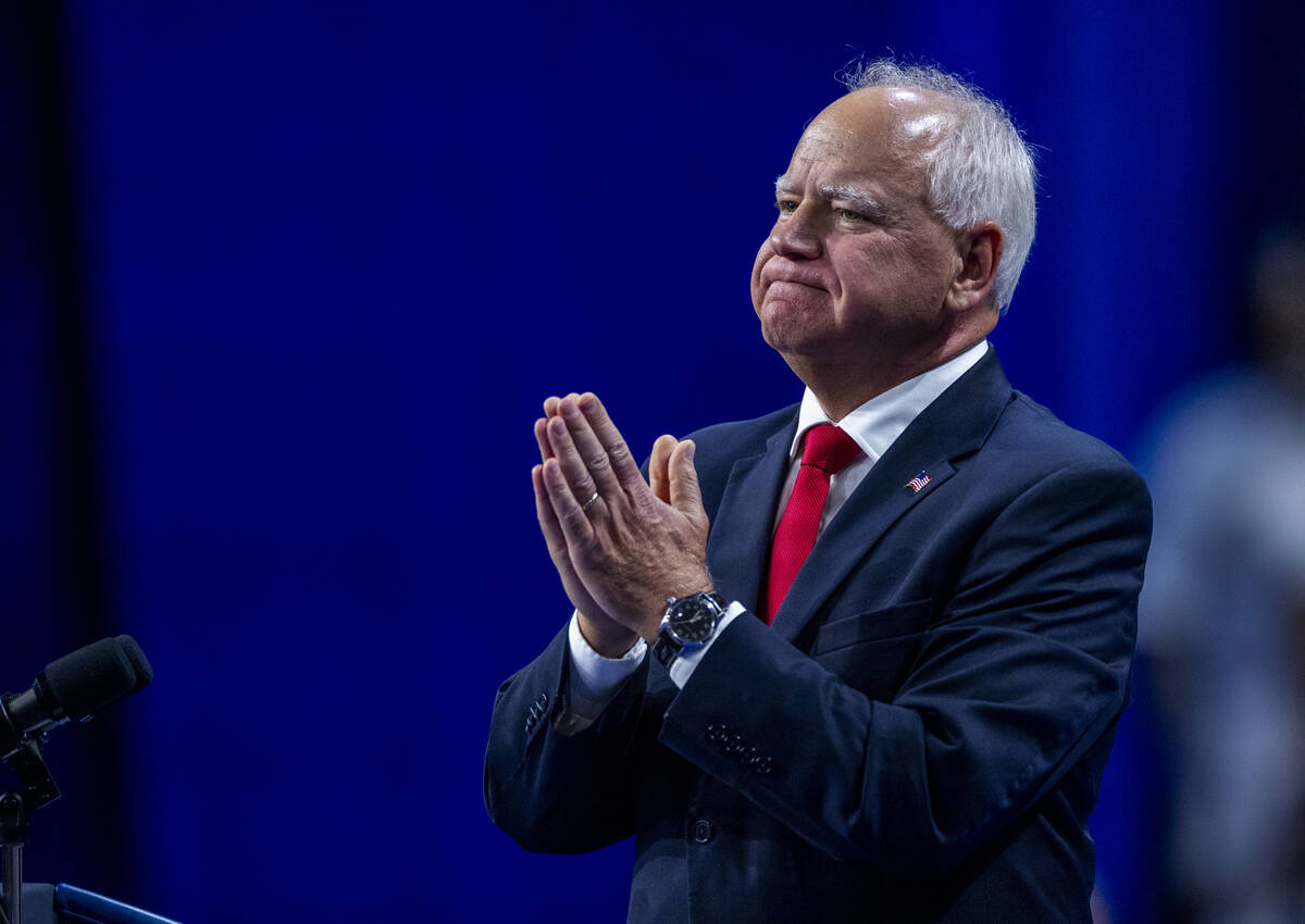 Minnesota Gov. Tim Walz speaks on stage as he and Vice President Kamala Harris hold a campaign ...