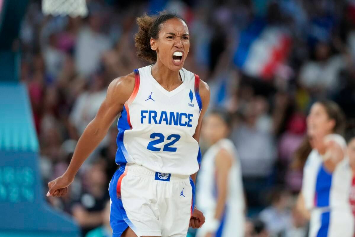 Marieme Badiane (22), of France, reacts during a women's gold medal basketball game at Bercy Ar ...