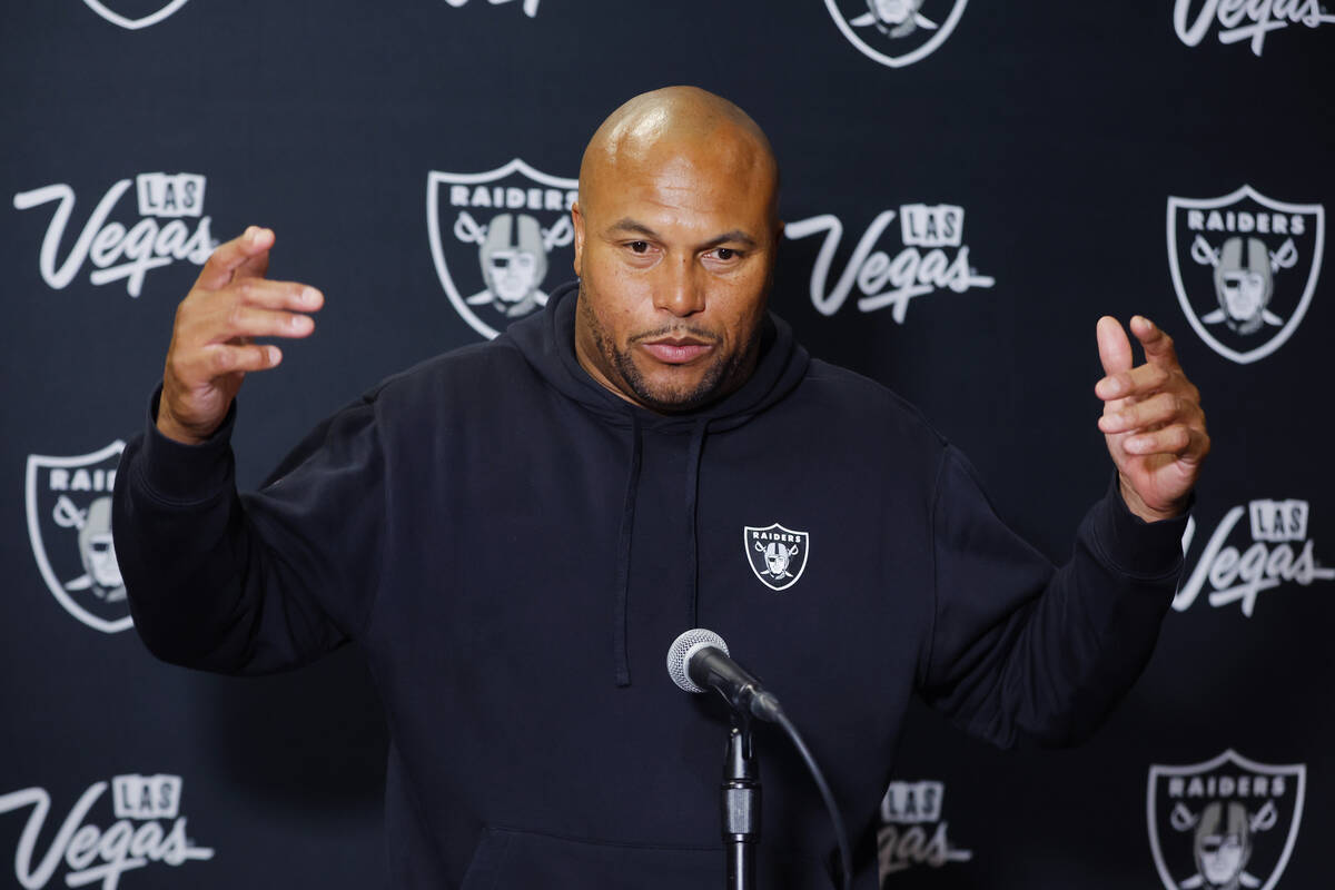 Las Vegas Raiders head coach Antonio Pierce talks to the media following an NFL football game a ...