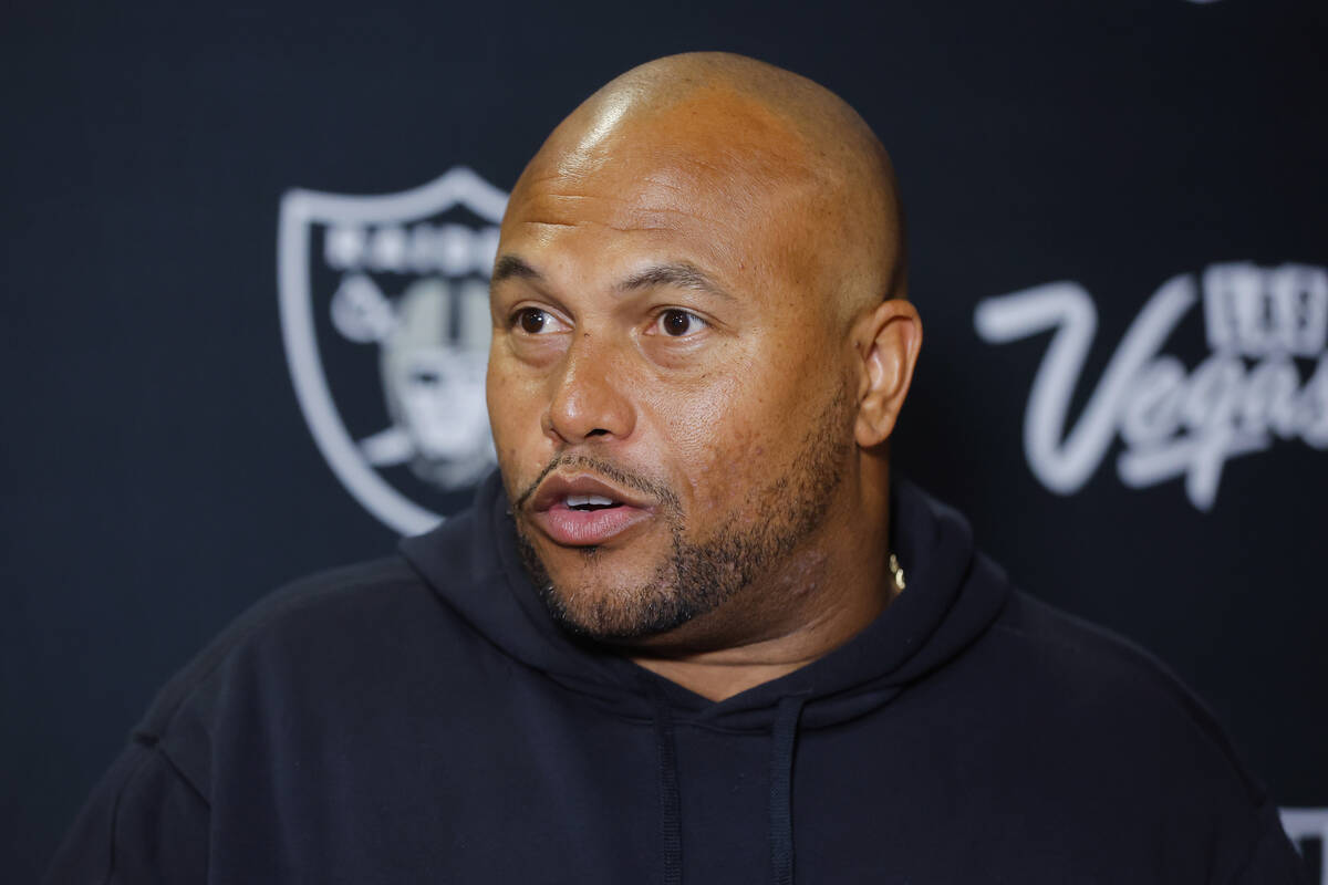 Las Vegas Raiders head coach Antonio Pierce talks to the media following an NFL football game a ...