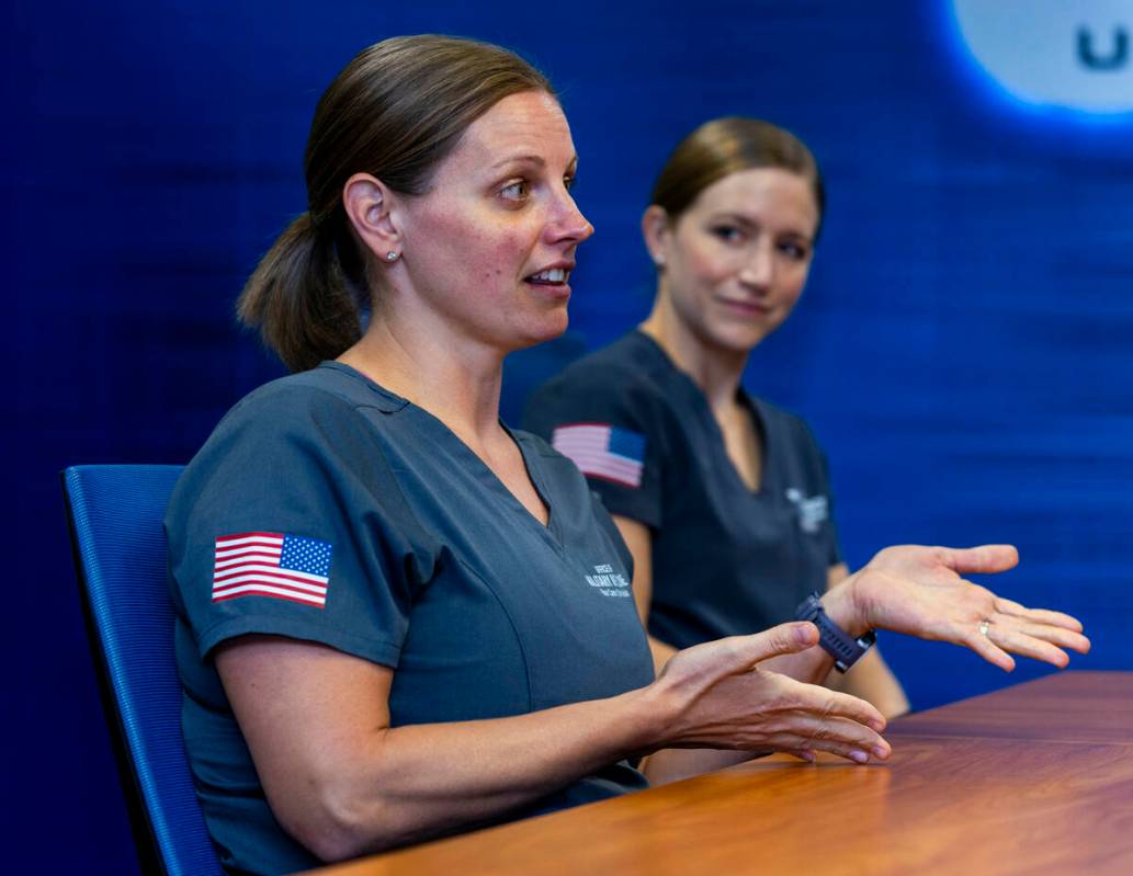 Lt. Col. Becky Bryant with Maj. Anna Prendergast, talks on her role as a ER nurse instructor du ...