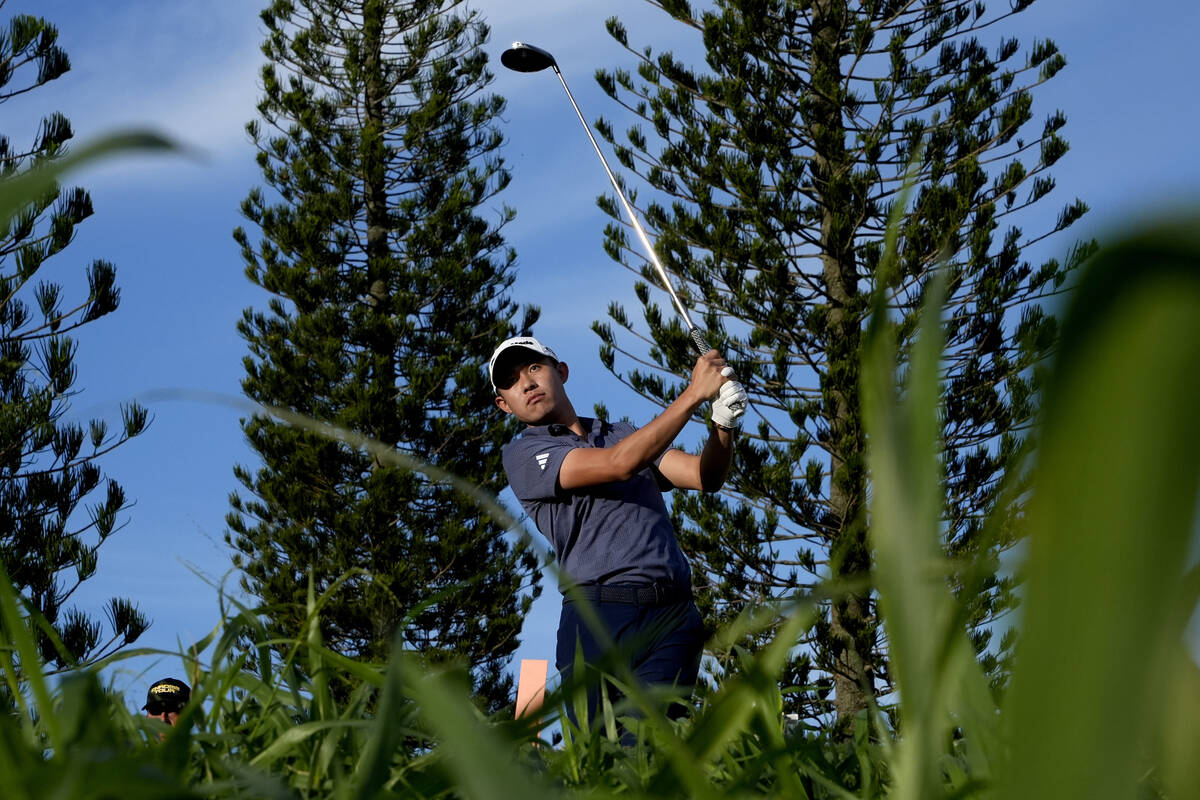 Collin Morikawa hits from the third tee during the first round of The Sentry golf event, Thursd ...