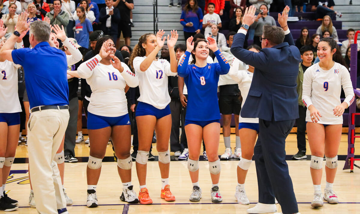 Bishop Gorman’s Head Coach Gregg Nunley congratulates his team after Bishop Gorman won the cl ...