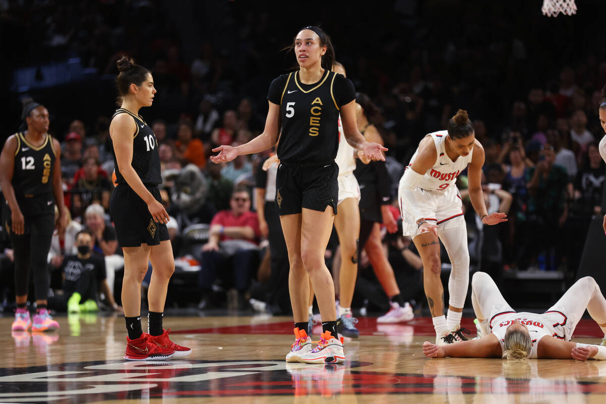 Las Vegas Aces forward Dearica Hamby (5) reacts after getting called for a fouled agains the Wa ...