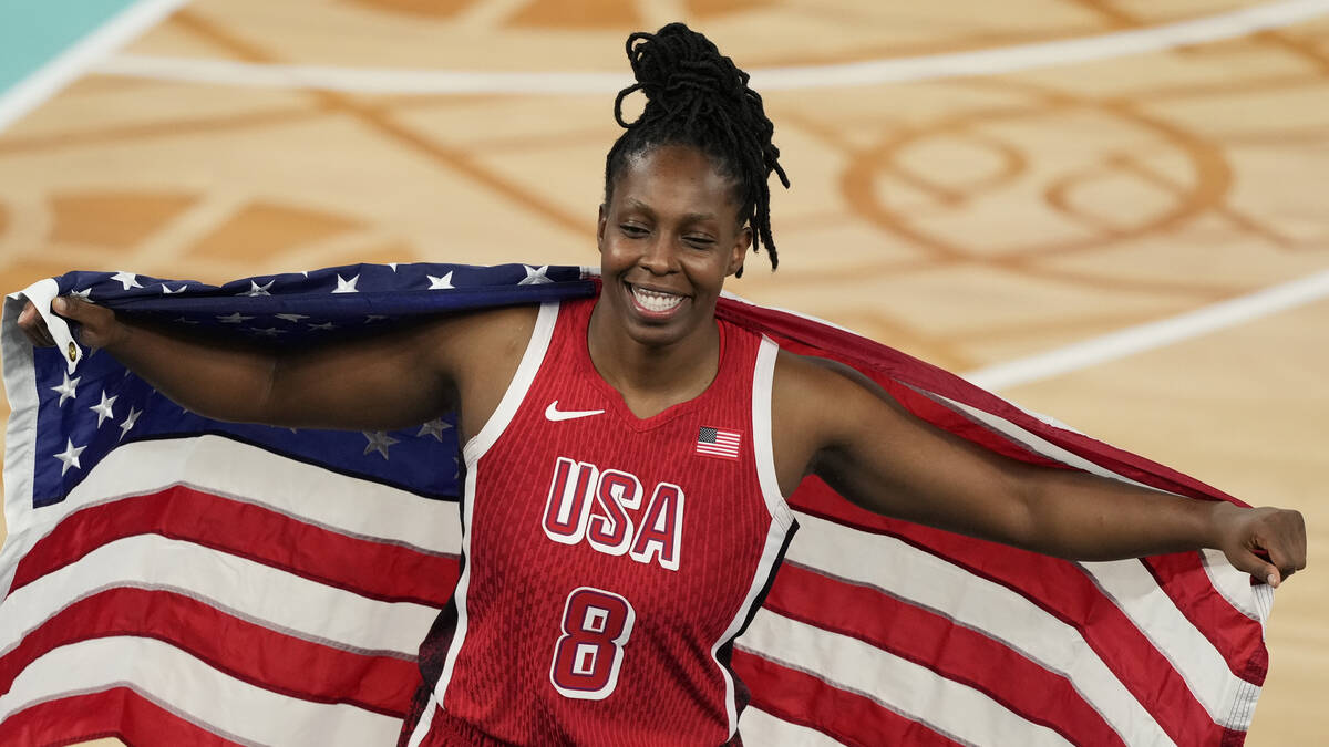 United States' Chelsea Gray (8) celebrates after a women's gold medal basketball game at Bercy ...