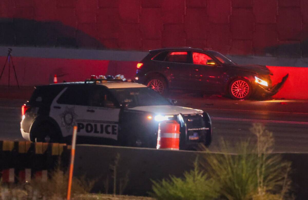 Police investigate a shooting on Interstate 15 southbound on Thursday, Aug. 8, 2024, in Las Veg ...