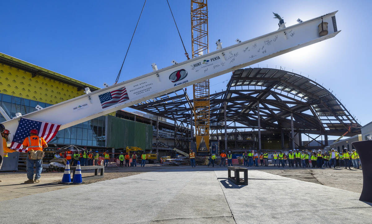 The final beam is raised as the Las Vegas Convention and Visitors Authority holds a topping-off ...