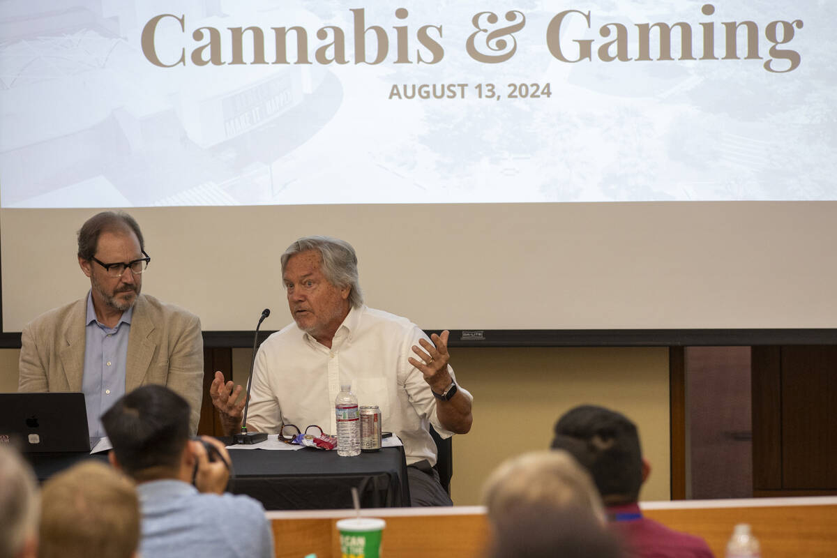 Cannabis attorney Bob Hoban, left, and Clark County Commissioner Tick Segerbloom, right, speak ...