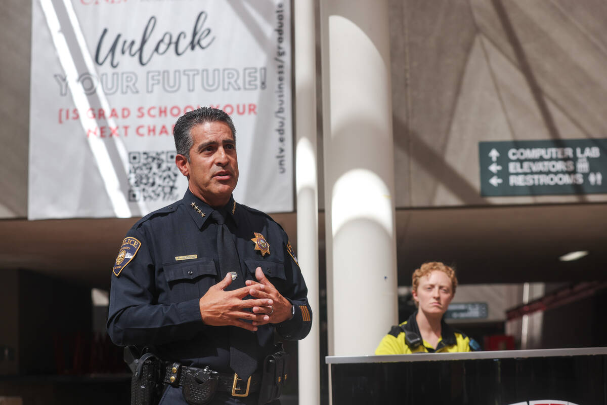 Arnold Vasquez, interim director of University Police Services, speaks to media during a tour o ...