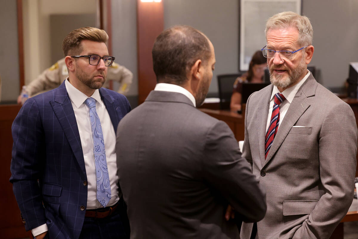 Robert Draskovich, right, and Michael Horvath, left, attorneys for Robert Telles, talk to Chief ...