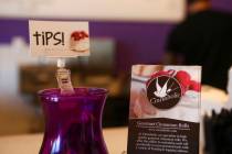 A tip jar is displayed next to menus in Las Vegas. (Las Vegas Review-Journal)