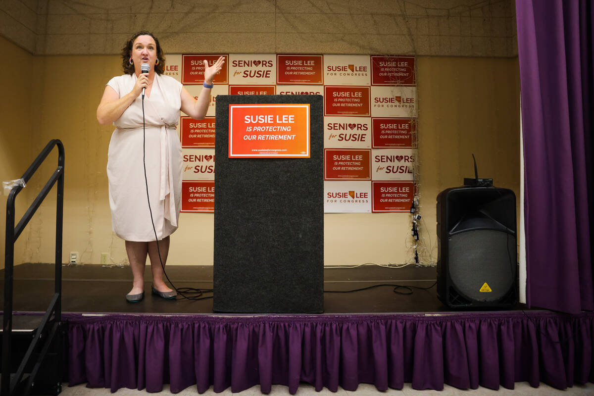 Rep. Katie Porter, D-Calif., speaks to a crowd during a small rally hosted by Rep. Susie Lee, D ...