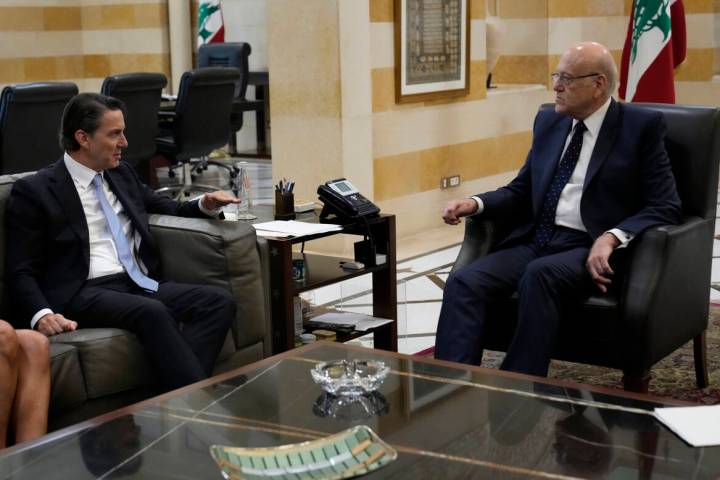 Senior Advisor to U.S. President Joe Biden Amos Hochstein, left, meets with Lebanese caretaker ...