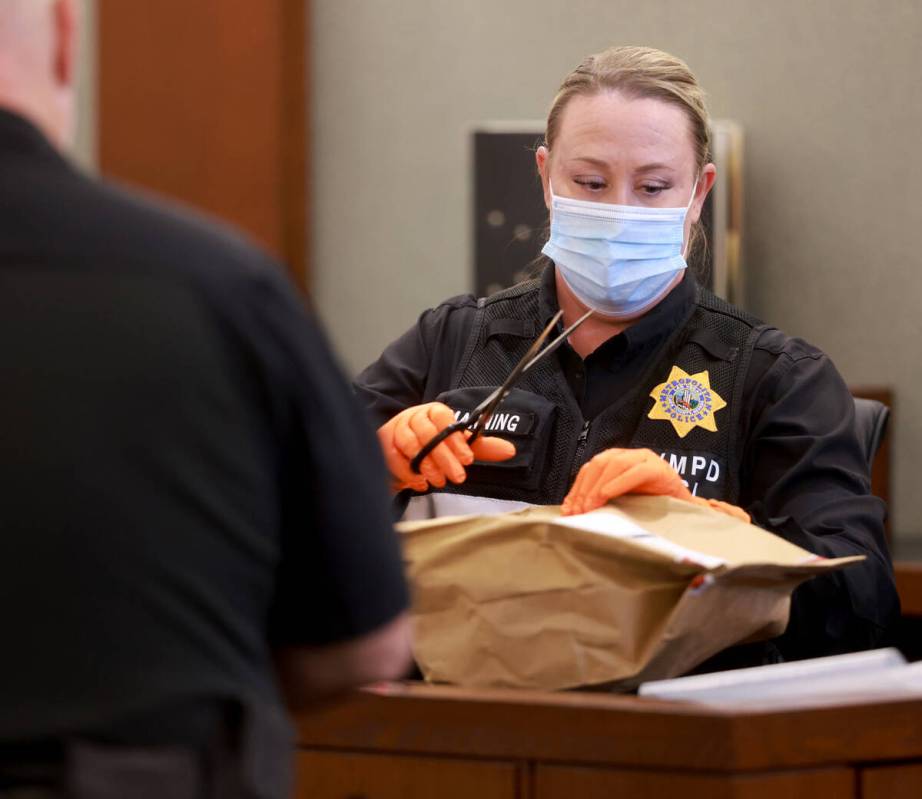 Jennifer Manning, a senior crime scene analyst with the Metropolitan Police Department, prepare ...