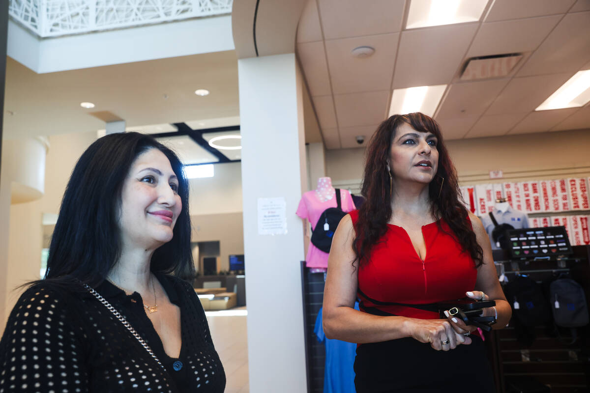 Realtor Vandana Bhalla, right, speaks to the Review-Journal alongside realtor Yared Rivera, lef ...