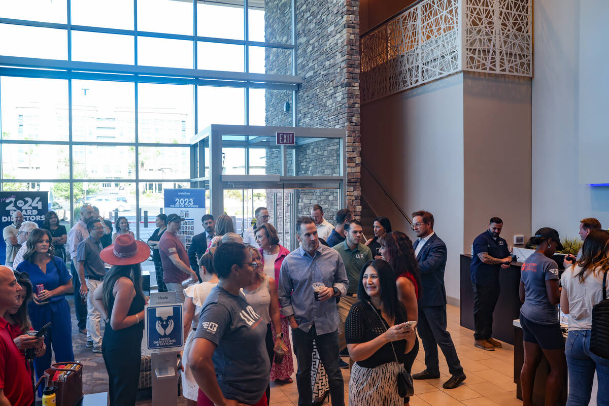 Realtors wait in the lobby of the Las Vegas Realtors headquarters in Las Vegas, Thursday, Aug. ...