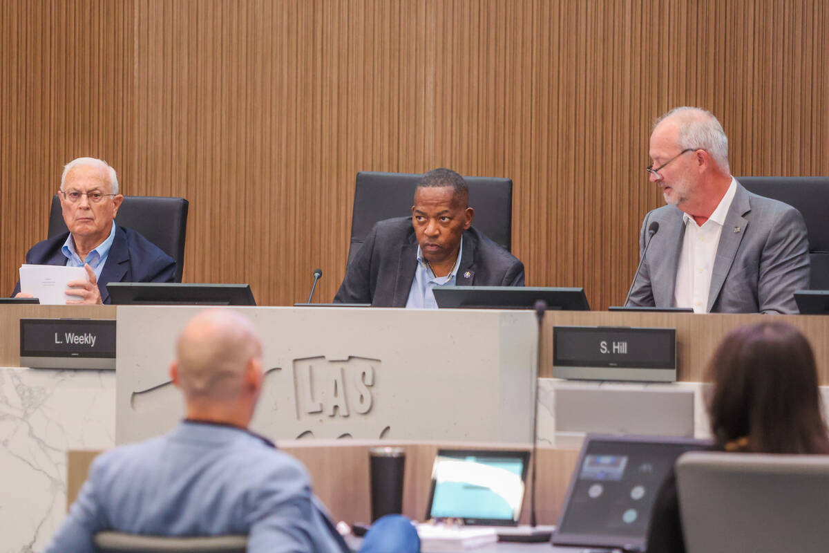 J. Tito Tiberti, from left, Lawrence Weekly and Steve Hill are seen during a Las Vegas Stadium ...