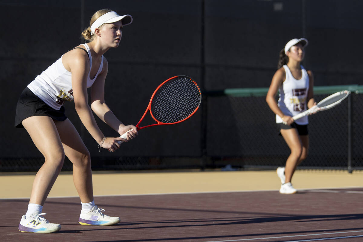 Faith Lutheran sophomore McCauley Hill, left, and senior Jordan Liang, right, compete during th ...