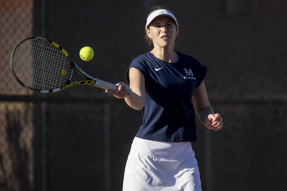 The Meadows senior Camilla Osipova competes during the tennis matches against Faith Lutheran at ...