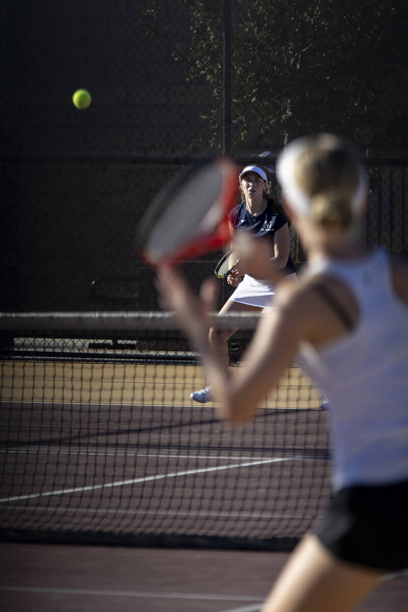 The Meadows senior Camilla Osipova, back, and Faith Lutheran sophomore McCauley Hill, front, co ...