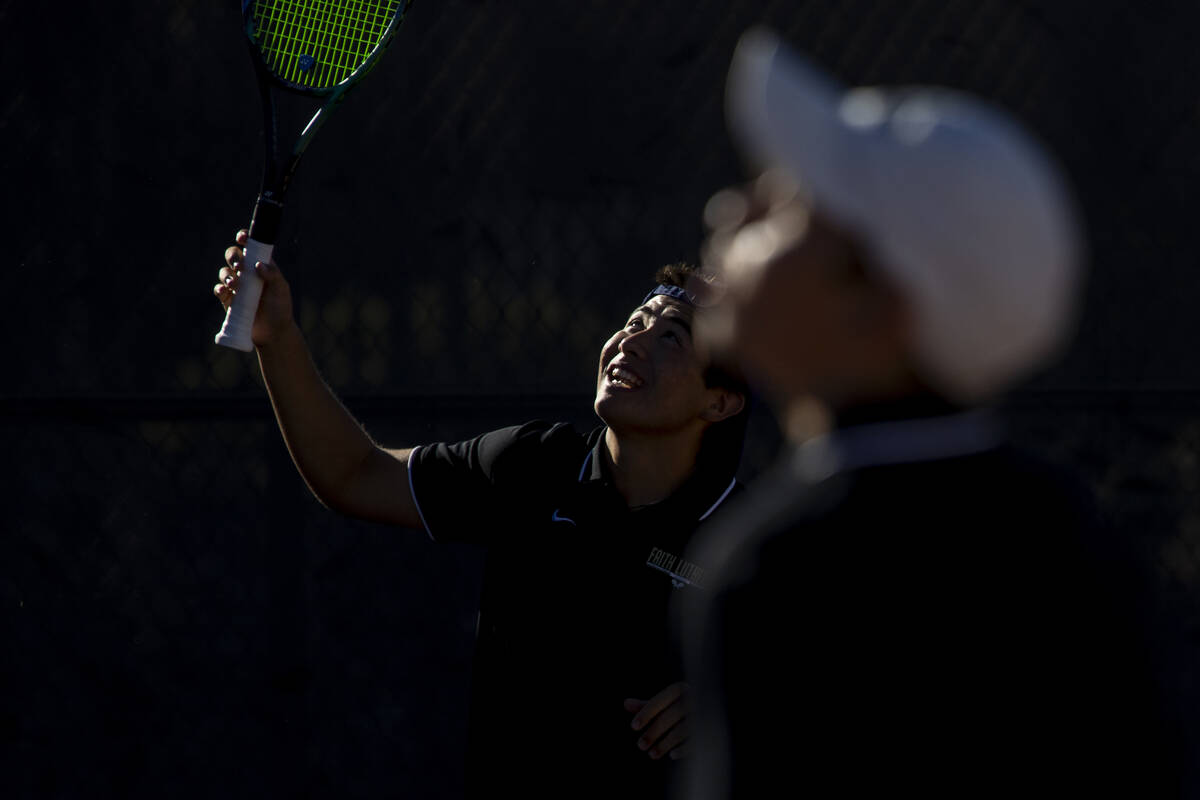 Faith Lutheran junior Samuel Gastaldo looks for the ball during the tennis matches against The ...