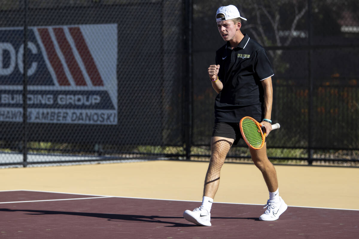 Faith Lutheran sophomore David Gluth III celebrates during the tennis matches against The Meado ...