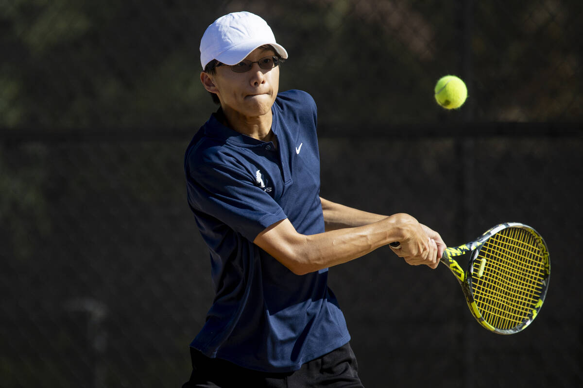 The Meadows junior Steven Tian competes during the tennis matches against Faith Lutheran at Fai ...