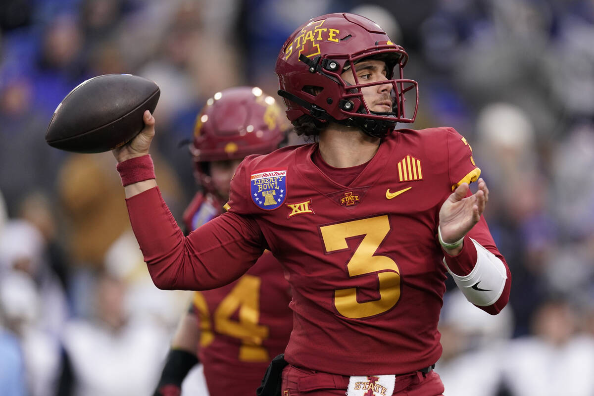 FILE - Iowa State quarterback Rocco Becht (3) looks to throw a pass during the first half of th ...