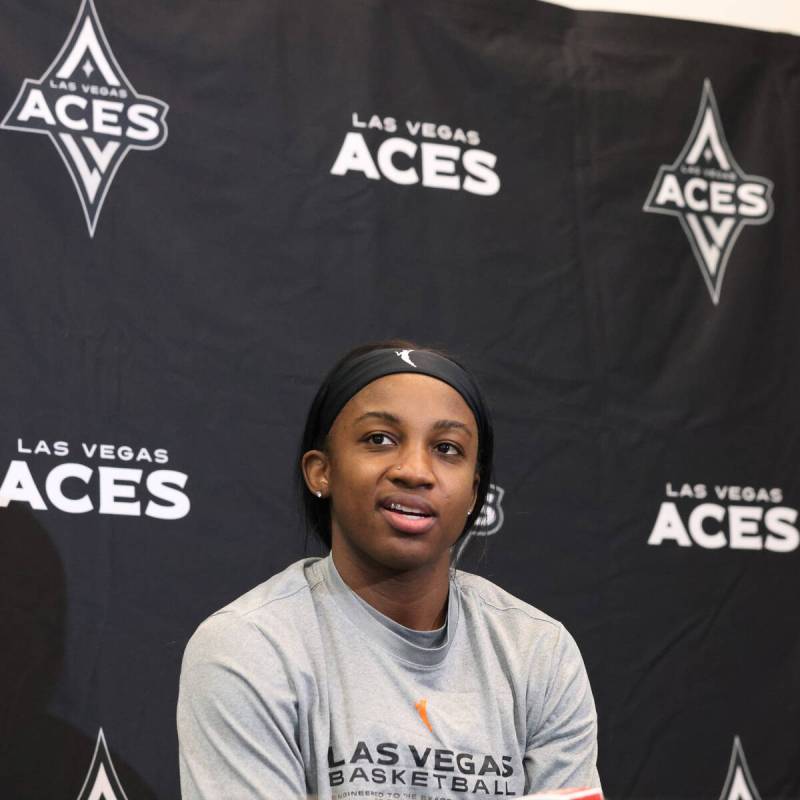 Las Vegas Aces guard Jackie Young answers a question during a news conference following the tea ...