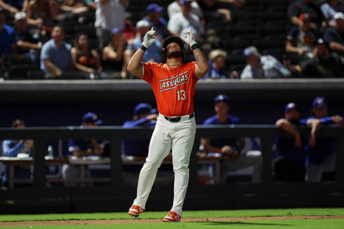 Las Vegas Aviators infielder Jordan Diaz gestures as he rounds the bases after hitting a home r ...