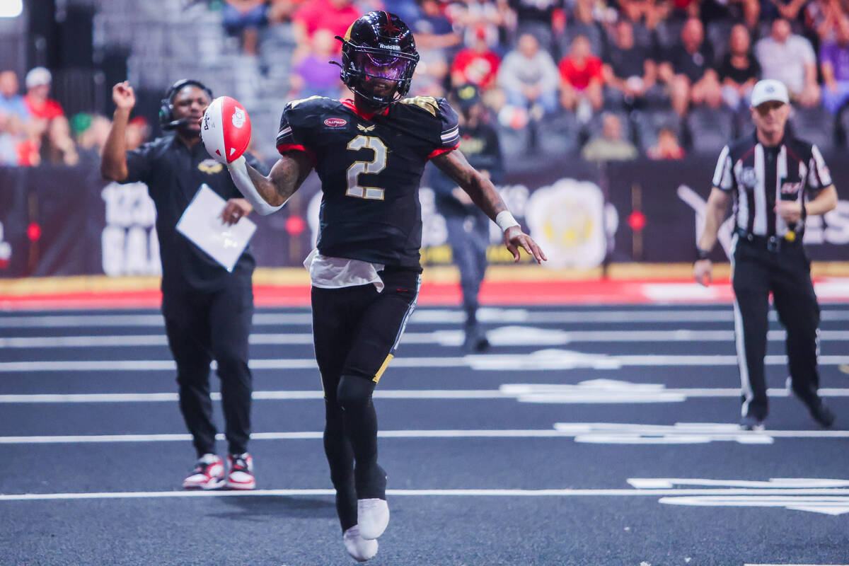 Knight Hawks quarterback Ja'Rome Johnson (2) runs the ball down the field during a playoff game ...