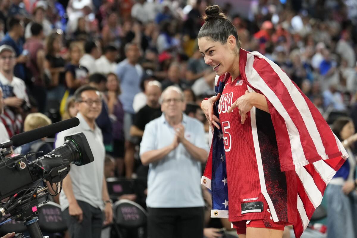 United States' Kelsey Plum (5) celebrates after a women's gold medal basketball game at Bercy A ...