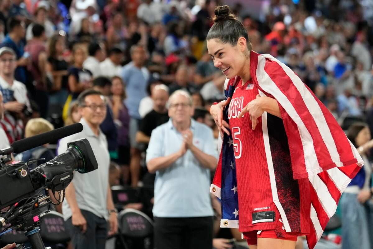 United States' Kelsey Plum (5) celebrates after a women's gold medal basketball game at Bercy A ...