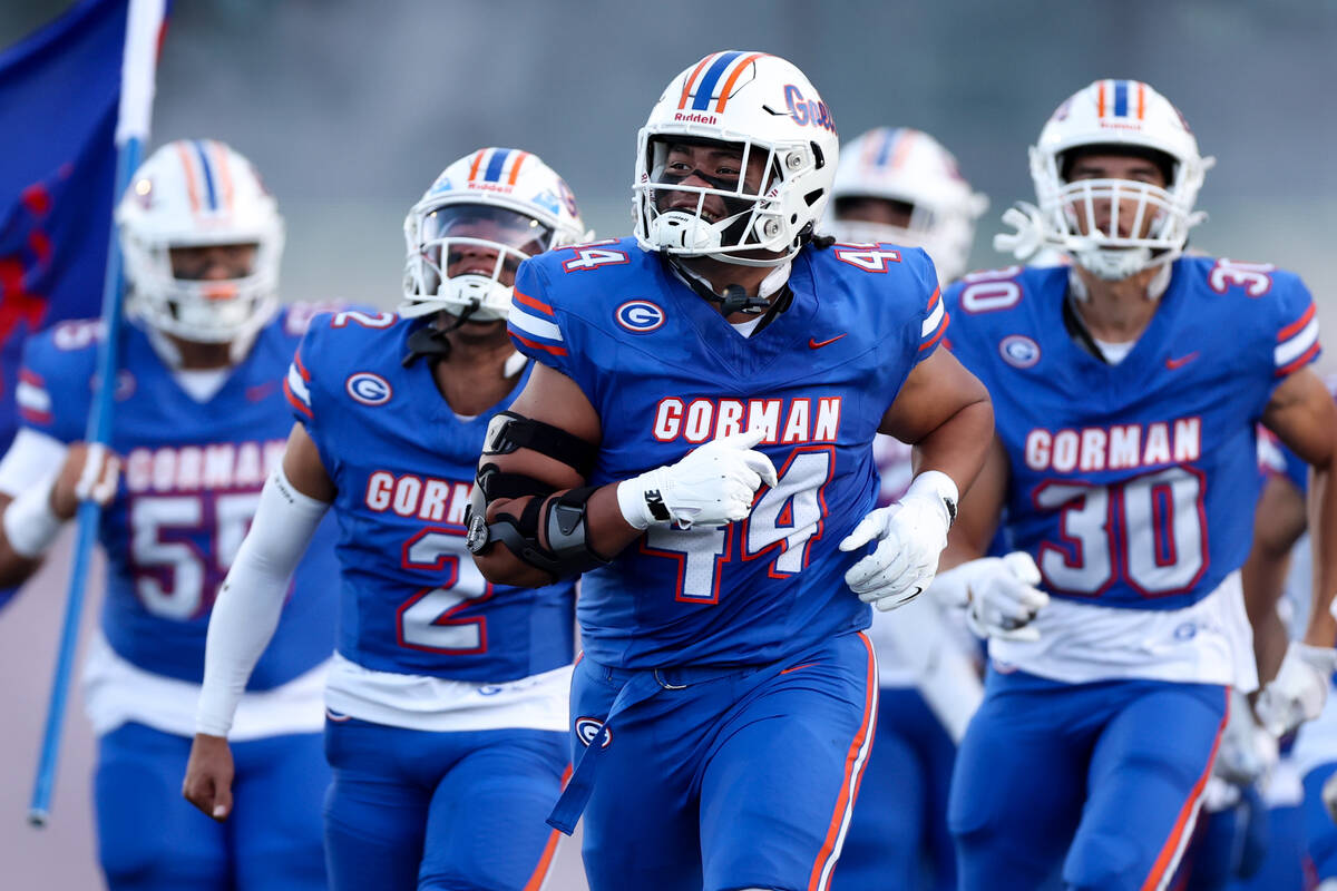 Bishop Gorman takes the field for their opening high school football game against Kahuku on Fri ...