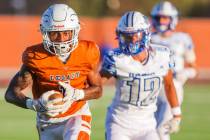 Legacy wide receiver Dominic Oliver (1) carries the ball to the end zone for a touchdown during ...