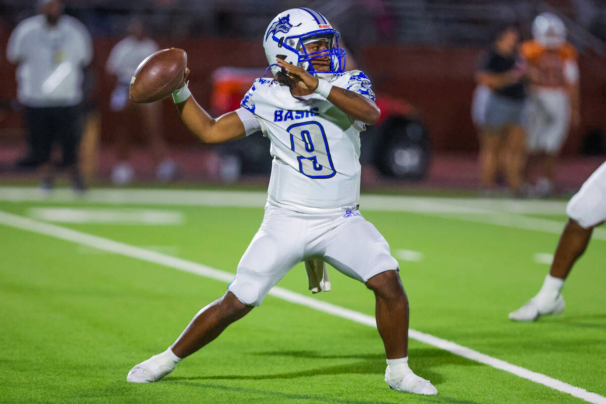 Basic quarterback Jayveon Rose (9) throws the ball during a football game between Legacy and Ba ...