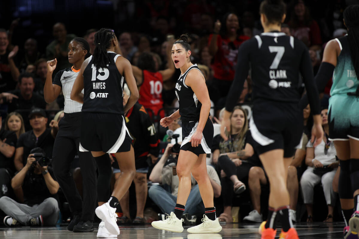 Las Vegas Aces guard Kelsey Plum (10) celebrates after scoring during the first half of a WNBA ...