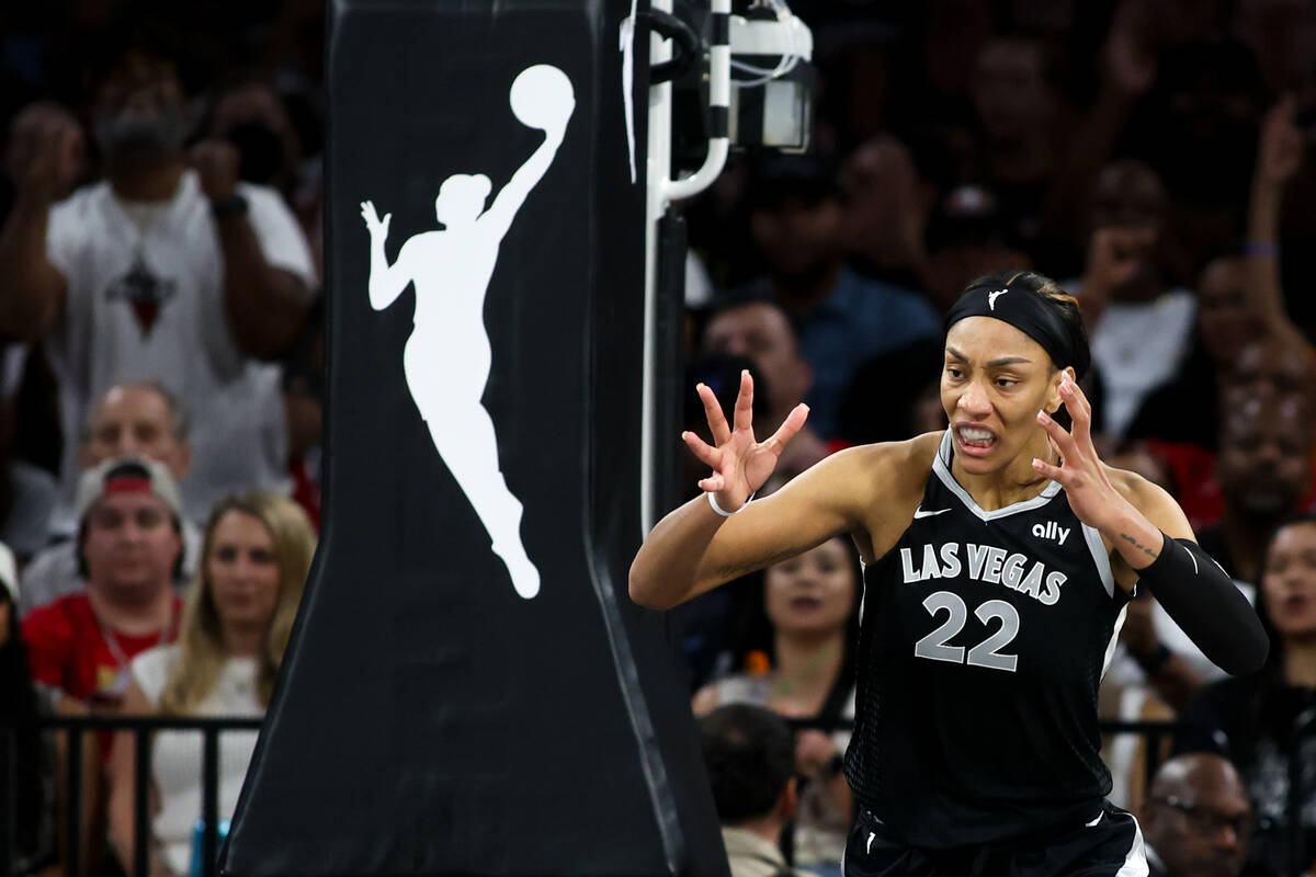 Las Vegas Aces center A'ja Wilson (22) reacts after missing a layup during the first half of a ...