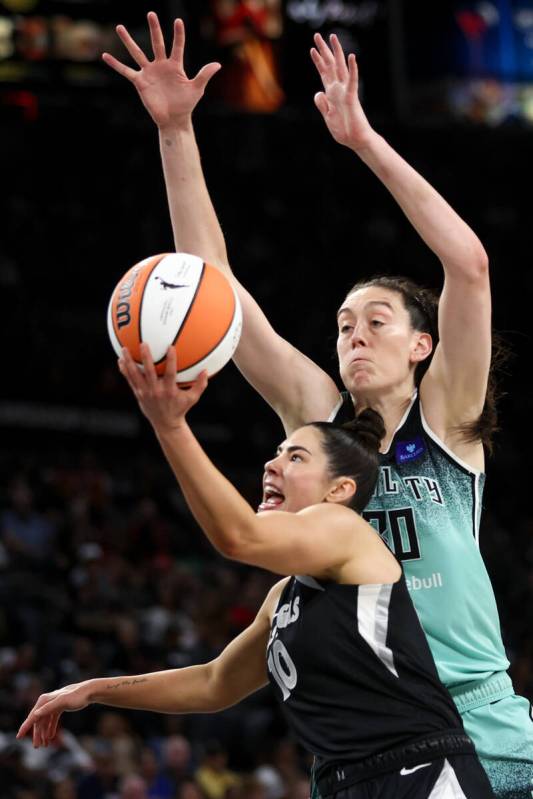 Las Vegas Aces guard Kelsey Plum (10) shoots against New York Liberty forward Breanna Stewart ( ...