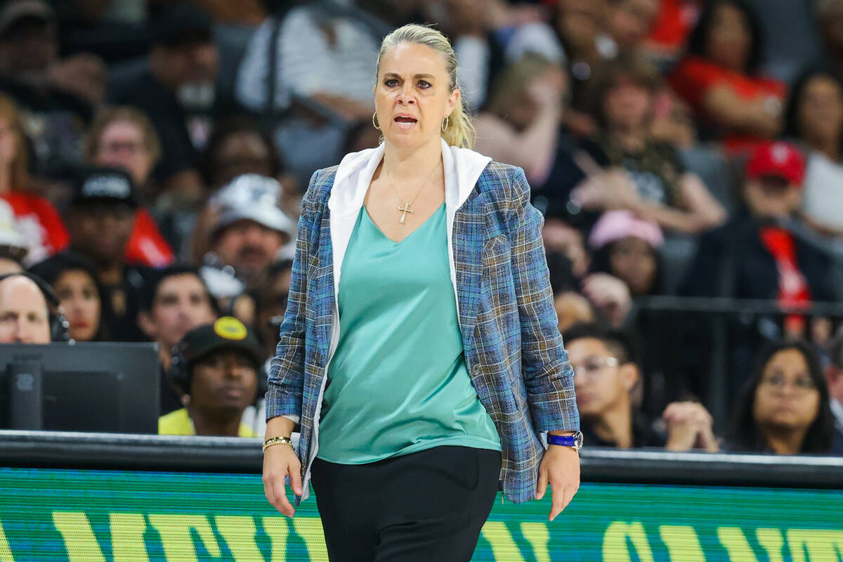 Aces head coach Becky Hammon coaches from the sidelines during a WNBA basketball game between t ...